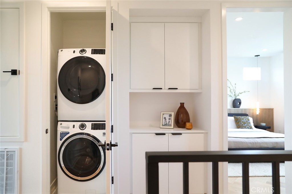151 Jessup Way Tustin, CA 92780 - Photo 32 of 33 a view of a utility room with dryer and washer