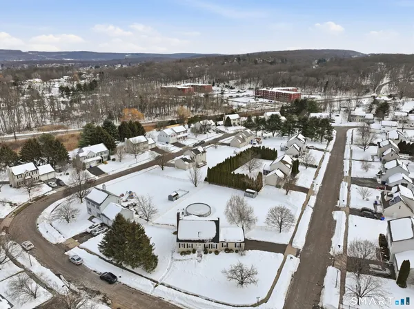 an aerial view of a city with ocean view