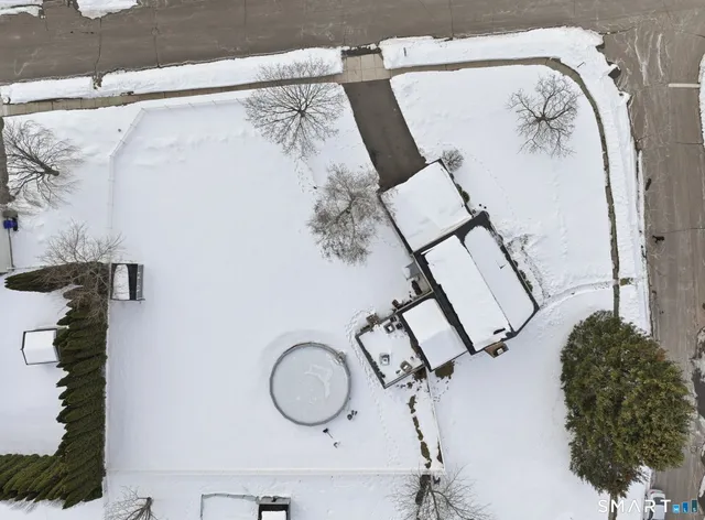a bathroom with a shower and a mirror
