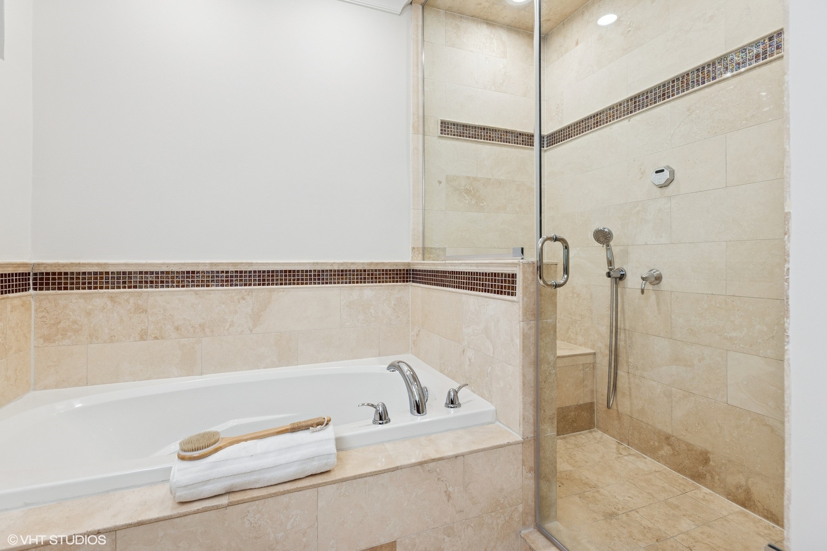 1035 West Monroe Street, Unit 1 Chicago, IL 60607 - Photo 24 of 27 a bathroom with a bathtub and shower