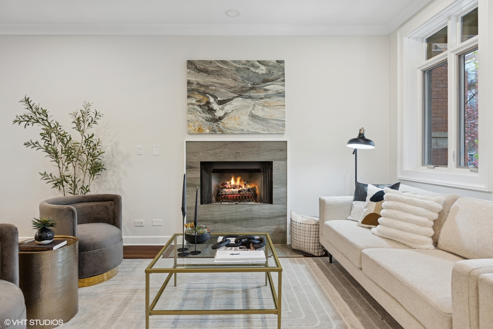 1035 West Monroe Street, Unit 1 Chicago, IL 60607 - Photo 3 of 27 a living room with furniture and a fireplace