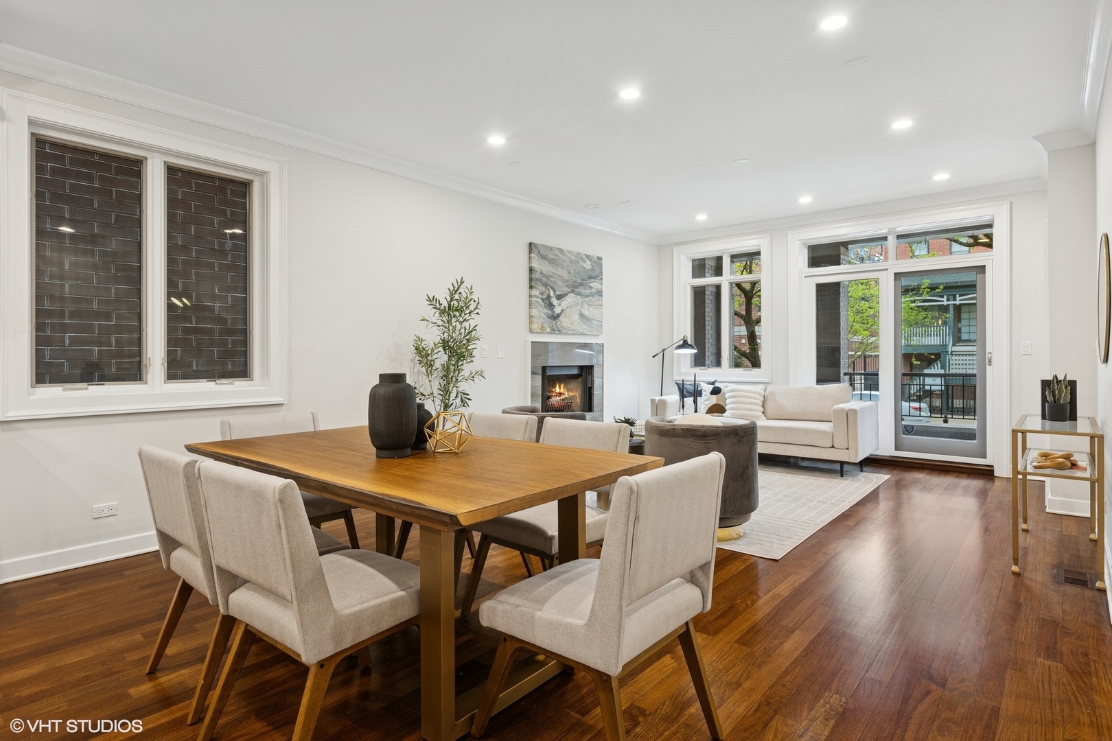 1035 West Monroe Street, Unit 1 Chicago, IL 60607 - Photo 6 of 27 a view of a dining room with furniture and wooden floor