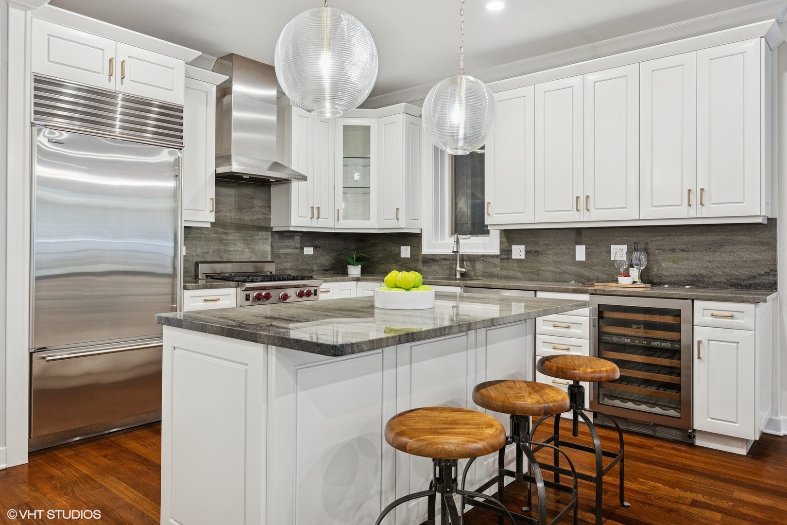 1035 West Monroe Street, Unit 1 Chicago, IL 60607 - Photo 9 of 27 a kitchen with stainless steel appliances granite countertop a sink stove and cabinets