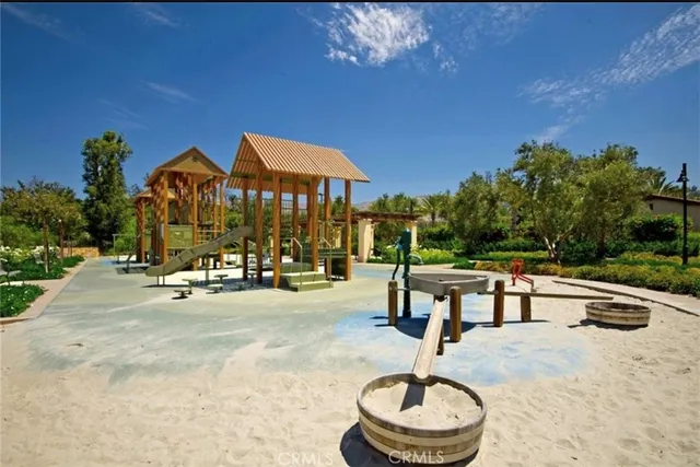 a view of a swimming pool with sitting area