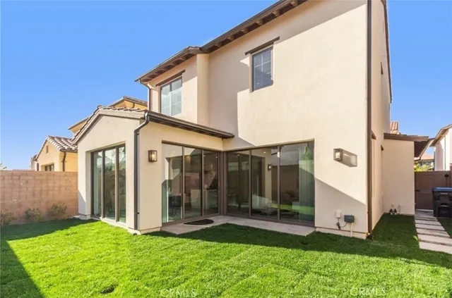 a view of a back yard of the house