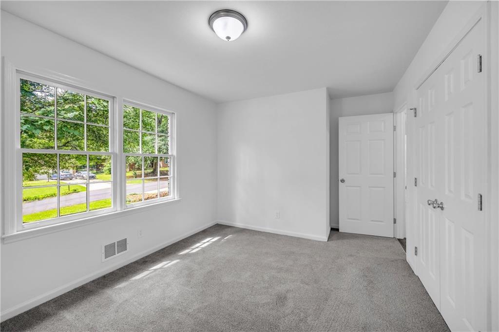 1586 Kings Road Marietta, GA 30062 - Photo 58 of 66 a view of an empty room with a window