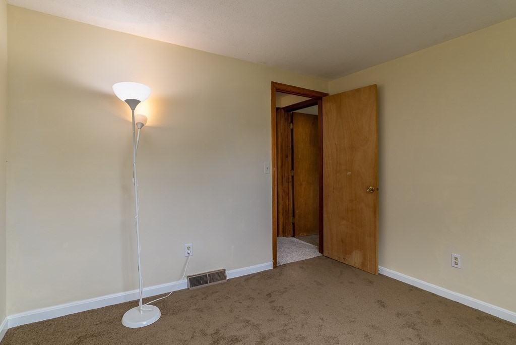 73 Sawmill Road Springfield, MA 01118 - Photo 11 of 30 an empty room with a bathroom
