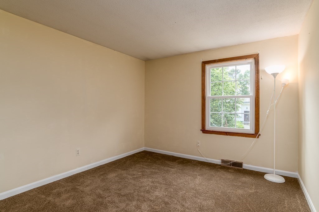 73 Sawmill Road Springfield, MA 01118 - Photo 14 of 30 an empty room with a window