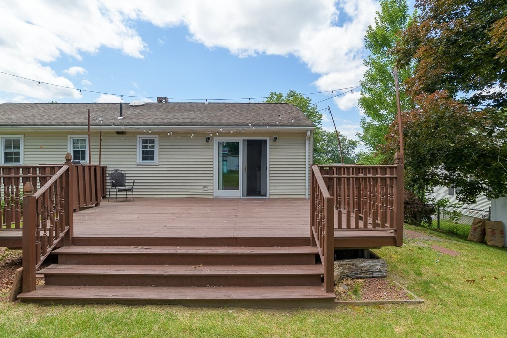 73 Sawmill Road Springfield, MA 01118 - Photo 26 of 30 a view of backyard with deck and outdoor seating
