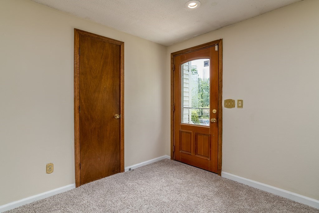 73 Sawmill Road Springfield, MA 01118 - Photo 5 of 30 an empty room that has a window