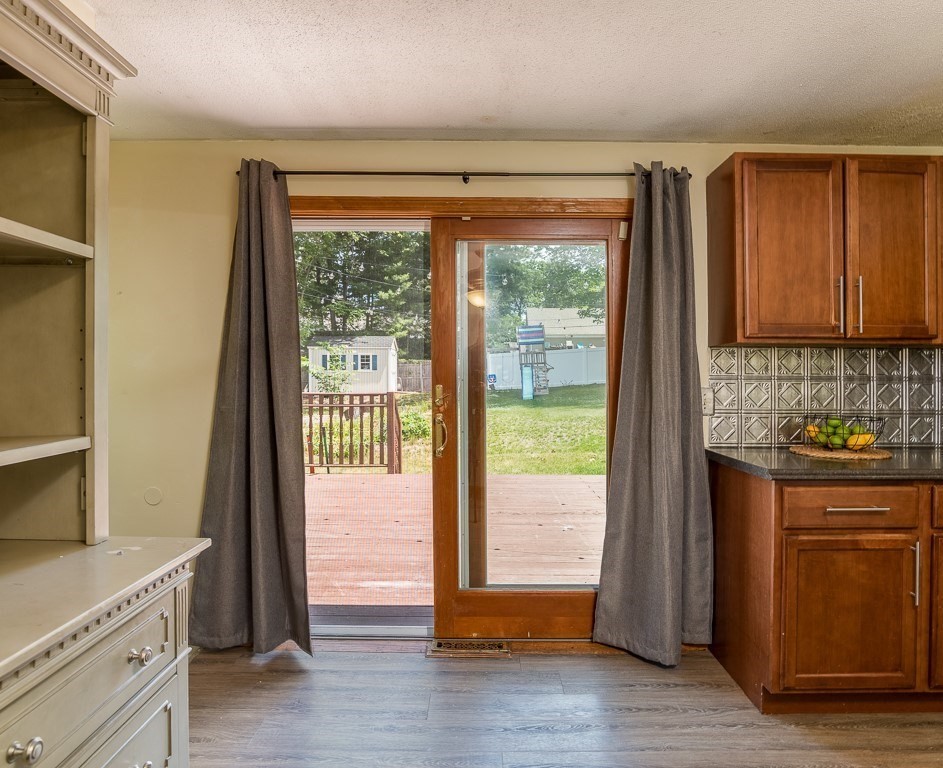 73 Sawmill Road Springfield, MA 01118 - Photo 8 of 30 a kitchen with a window a sink and a refrigerator