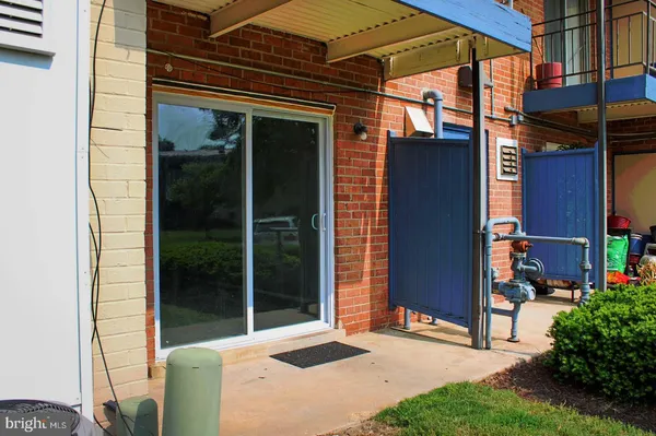a view of a house with a door and a porch