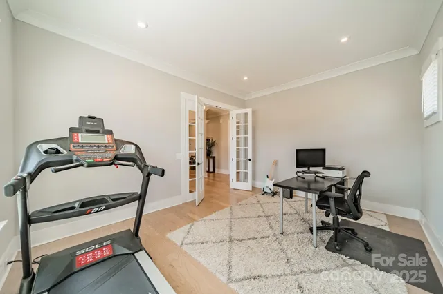 a room with furniture and wooden floor