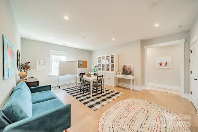 a living room with furniture and a table