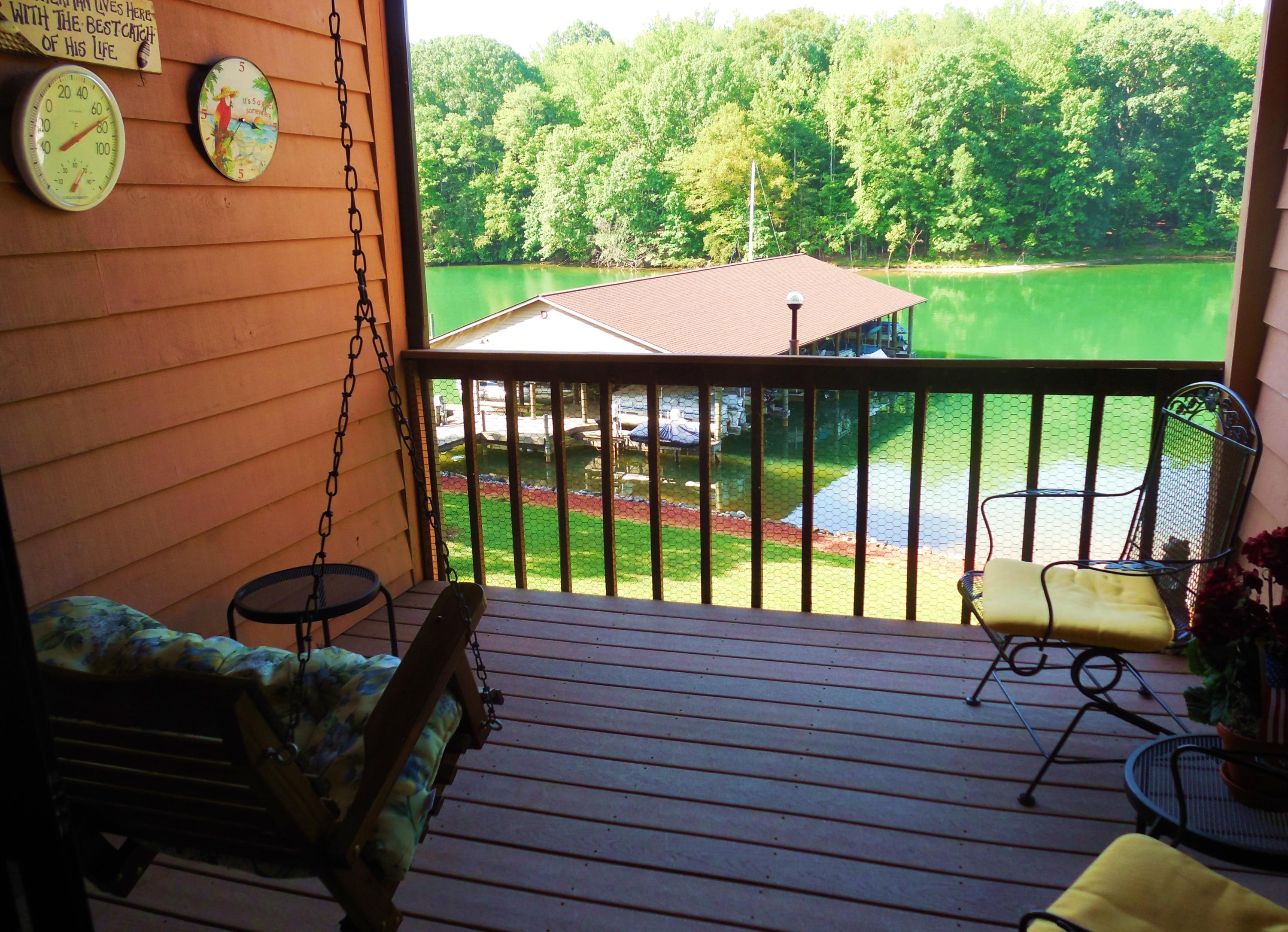 610 Monte Vista Road, Unit 705 Union Hall, VA 24176 - Photo 11 of 74 a view of a chairs and table on the wooden deck