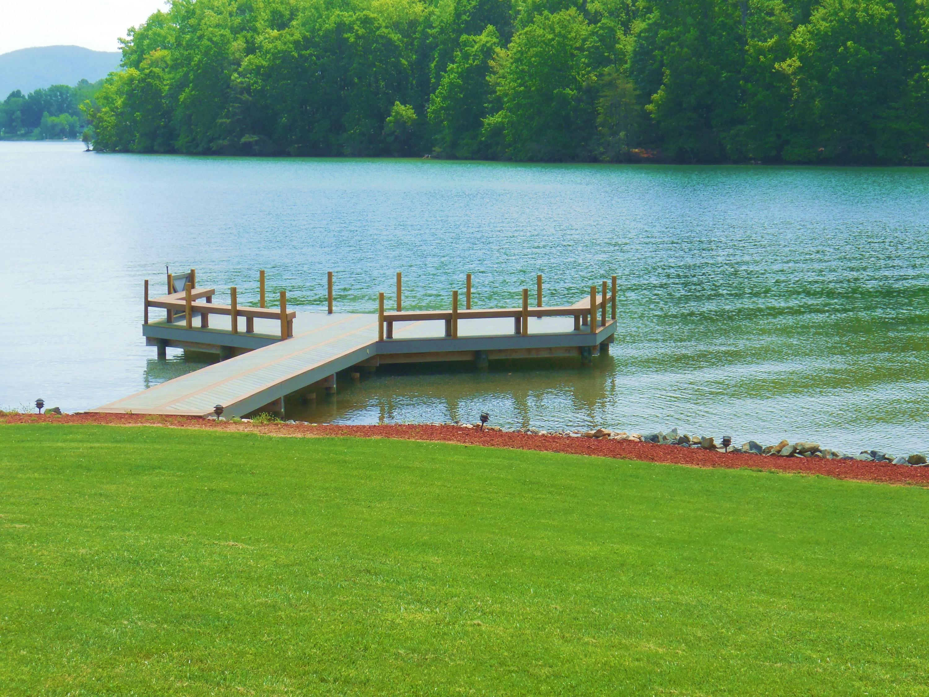 610 Monte Vista Road, Unit 705 Union Hall, VA 24176 - Photo 19 of 74 a view of a lake with houses in the background