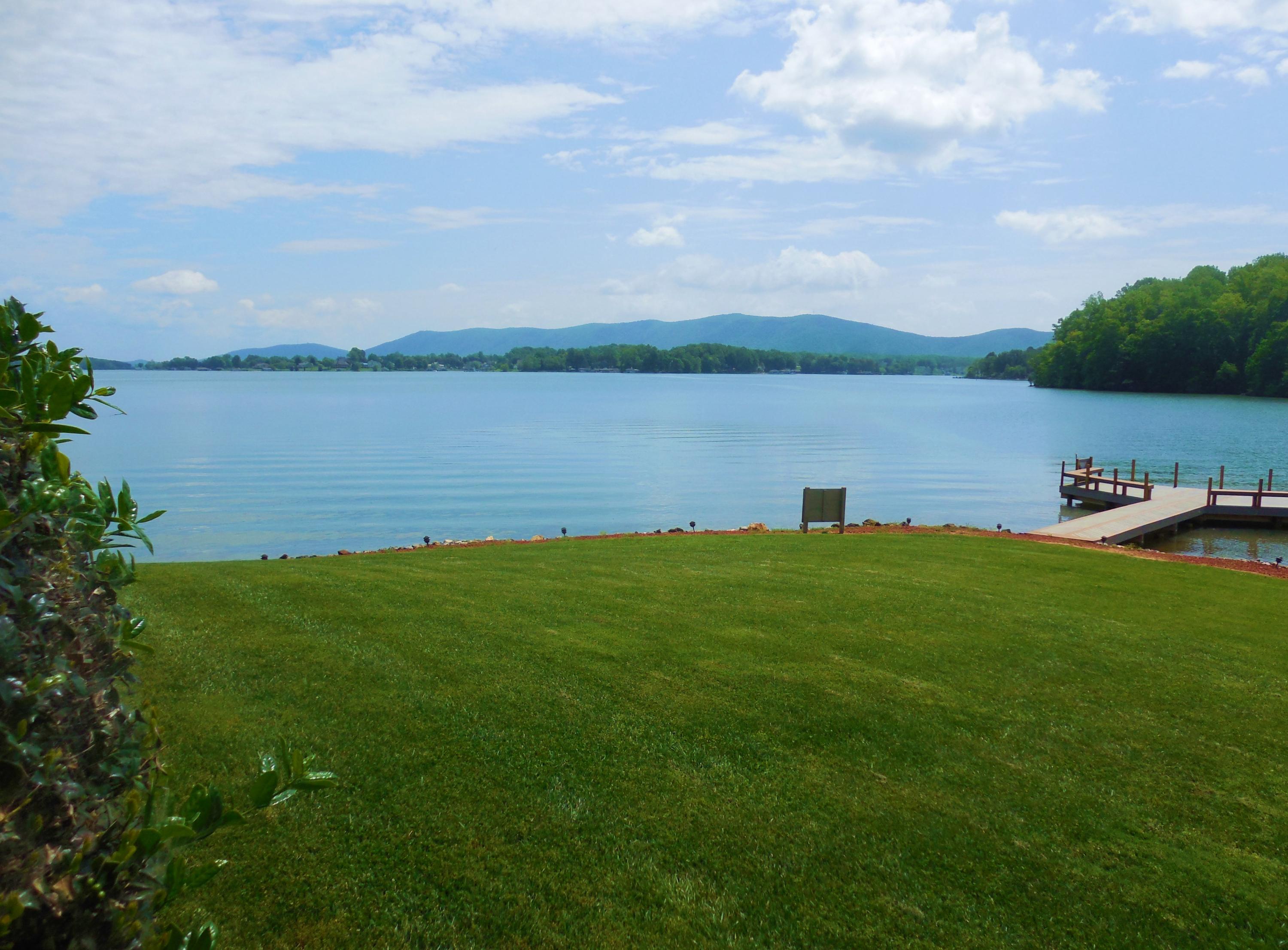 610 Monte Vista Road, Unit 705 Union Hall, VA 24176 - Photo 22 of 74 a view of a lake from a yard