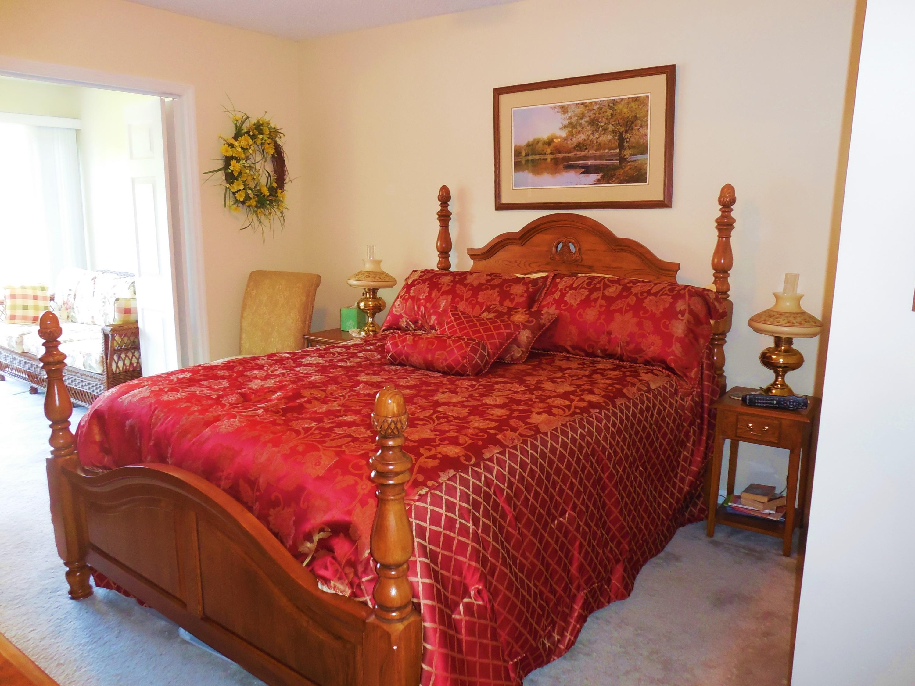 610 Monte Vista Road, Unit 705 Union Hall, VA 24176 - Photo 29 of 74 a bedroom with a bed and painting on the wall