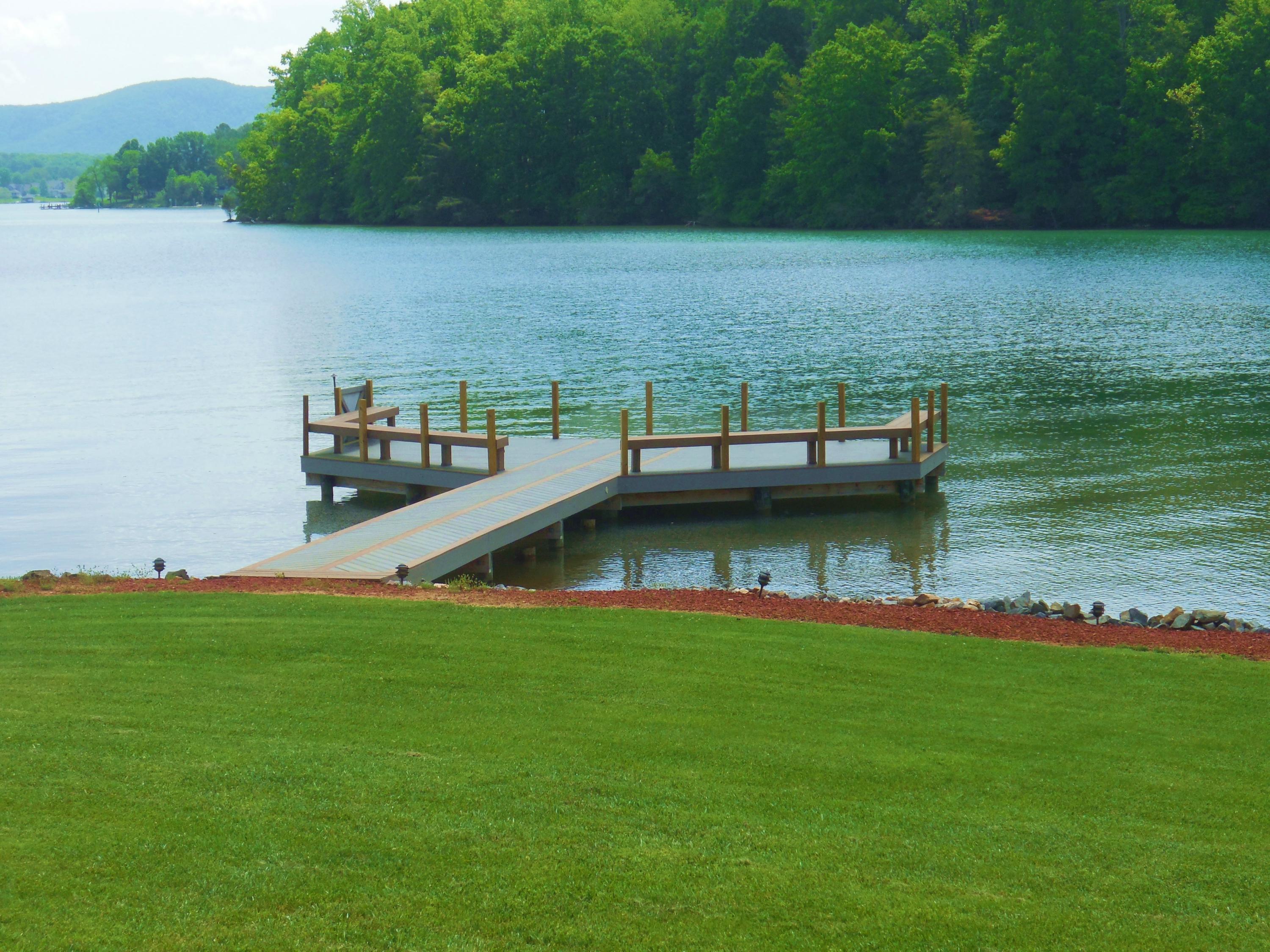 610 Monte Vista Road, Unit 705 Union Hall, VA 24176 - Photo 42 of 74 a view of a lake with houses in the background
