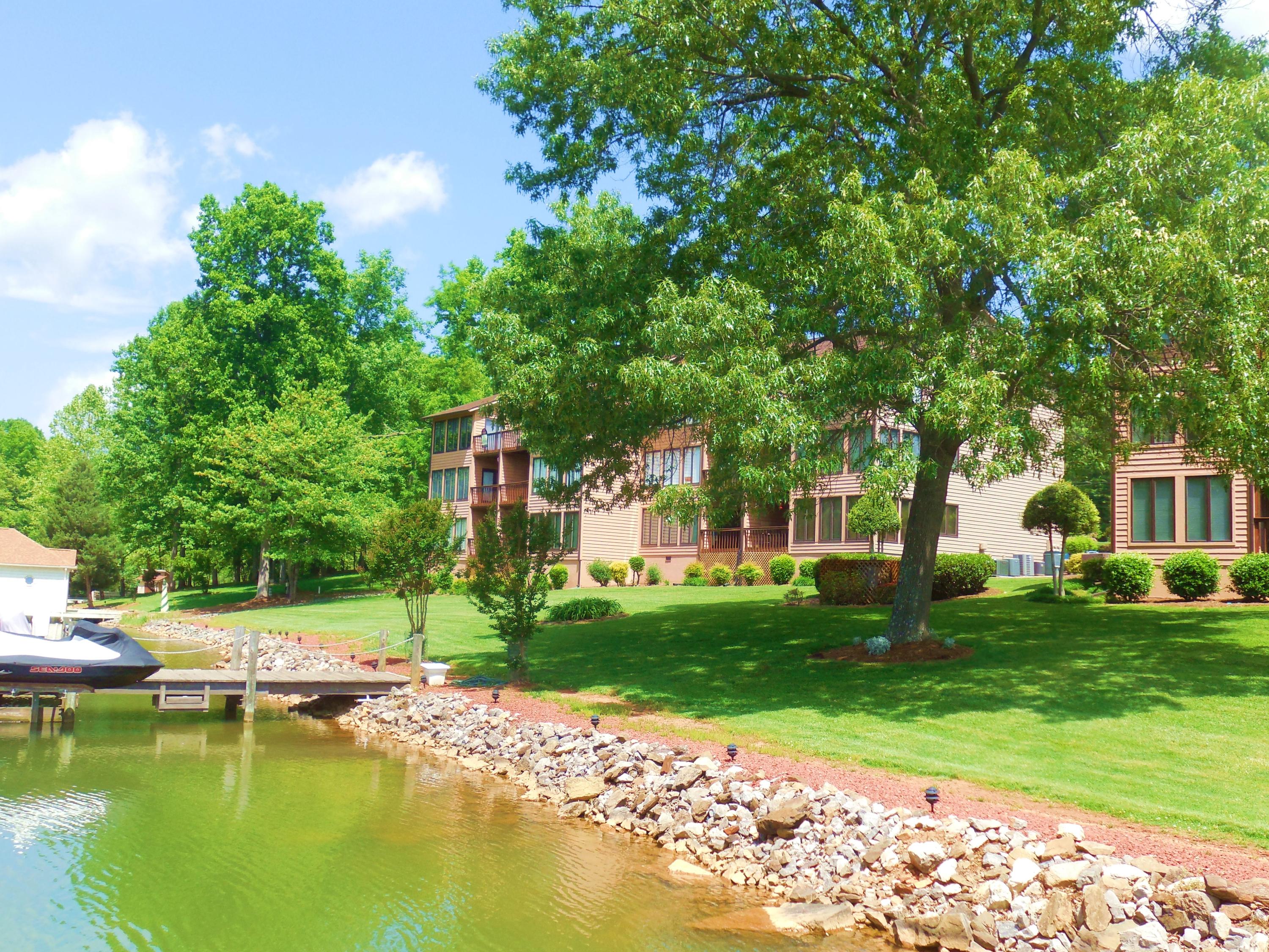 610 Monte Vista Road, Unit 705 Union Hall, VA 24176 - Photo 59 of 74 a view of a swimming pool with lawn chairs and plants