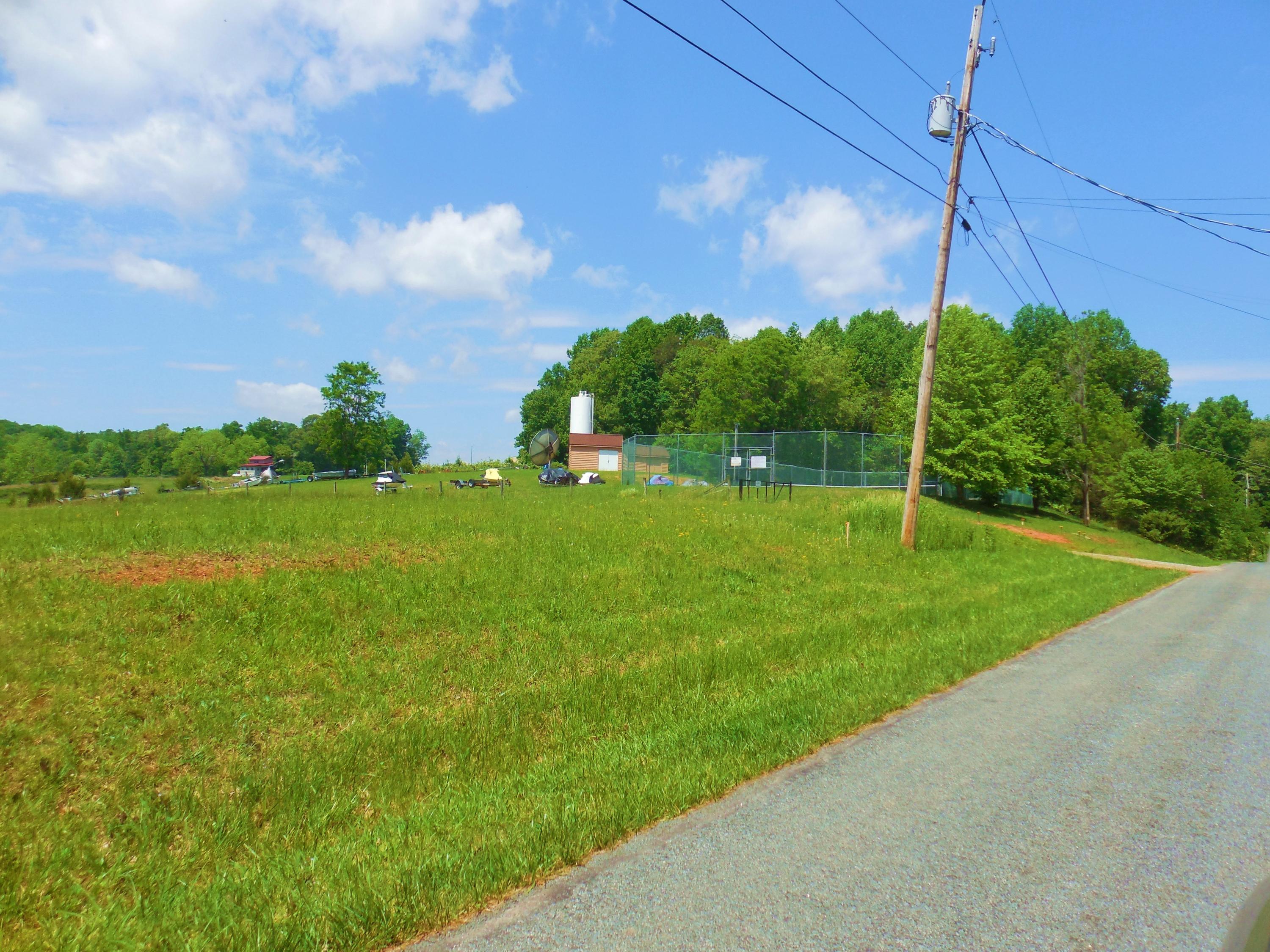 610 Monte Vista Road, Unit 705 Union Hall, VA 24176 - Photo 65 of 74 a view of a golf course with a lake
