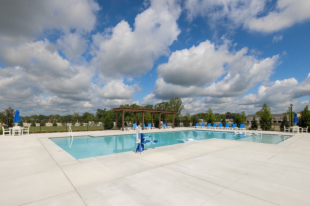 233 Black Swann Road Auburn, AL 36832 - Photo 21 of 26 Relax and unwind by the community pool, surrounded by lush greenery and a tranquil atmosphere.