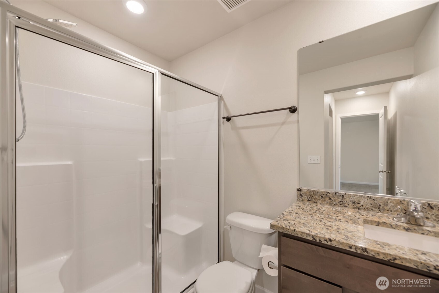 31723 120th Street Southeast Sultan, WA 98294 - Photo 12 of 27 a bathroom with a granite countertop sink toilet and shower