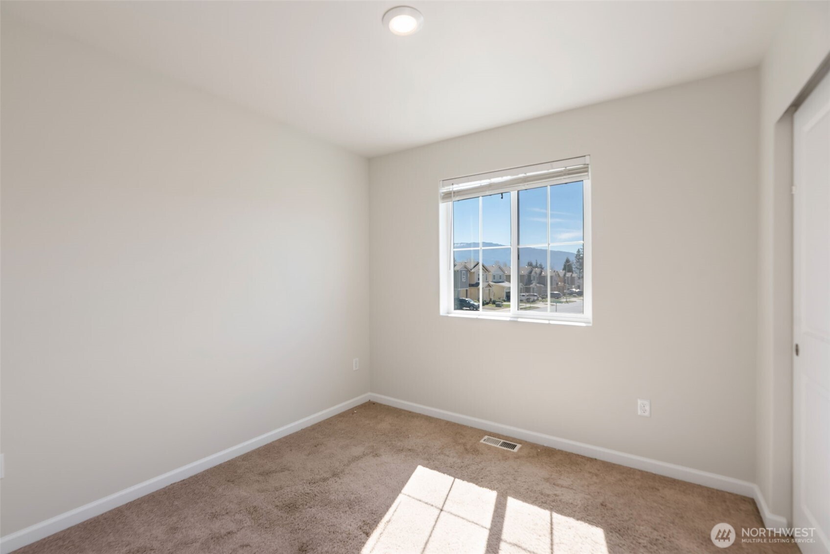 31723 120th Street Southeast Sultan, WA 98294 - Photo 15 of 27 an empty room with a window