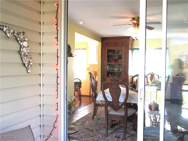 a view of a bathroom with a glass door shower and a mirror