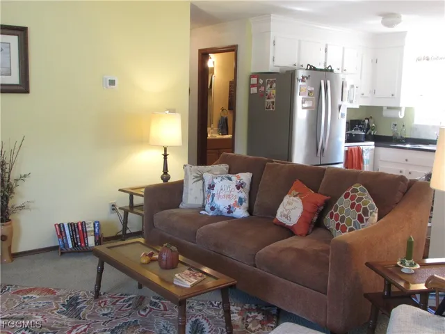 a living room with furniture and a couch
