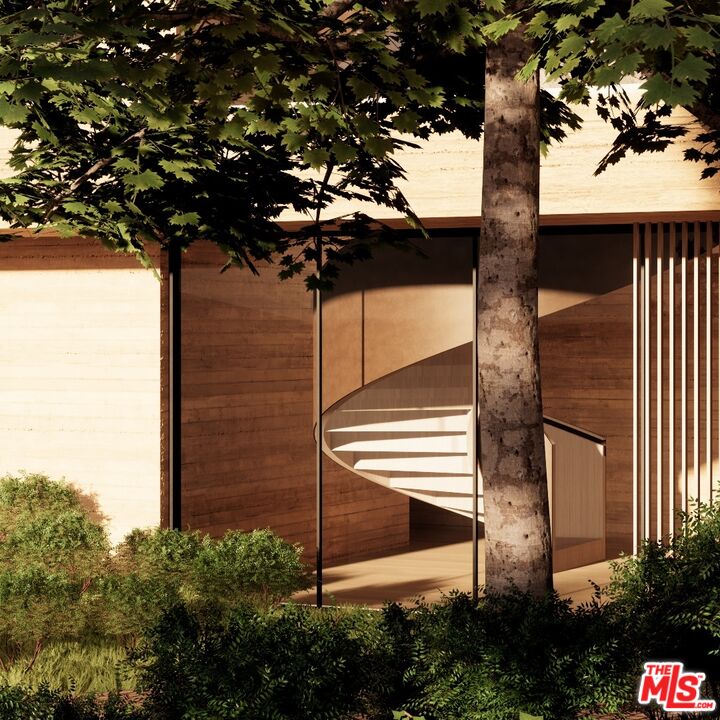 1001 Bel Air Road Los Angeles, CA 90077 - Photo 11 of 22 a small garden covered with tall trees