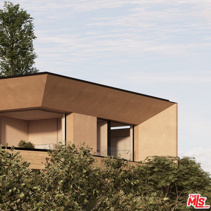 1001 Bel Air Road Los Angeles, CA 90077 - Photo 12 of 22 a backyard of a house with lots of green space