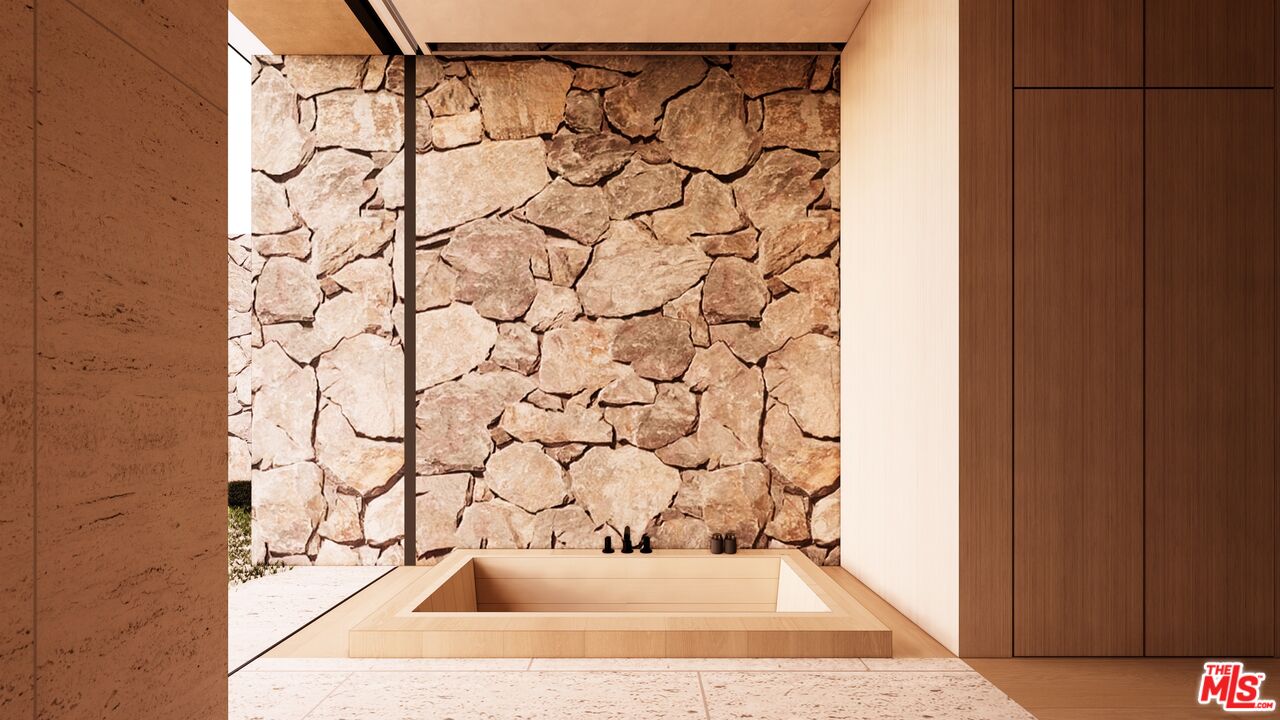 1001 Bel Air Road Los Angeles, CA 90077 - Photo 15 of 22 a bathroom with a bathtub and shower