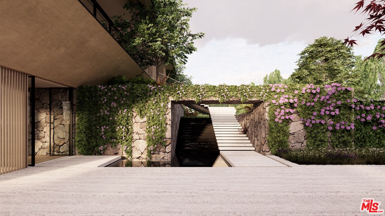 1001 Bel Air Road Los Angeles, CA 90077 - Photo 4 of 22 a view of a house with a pathway