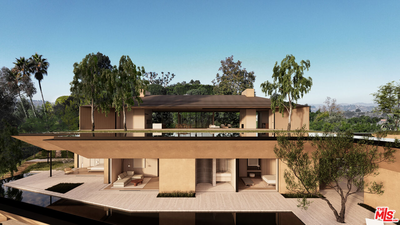 1001 Bel Air Road Los Angeles, CA 90077 - Photo 6 of 22 a view of a chairs and table on the terrace