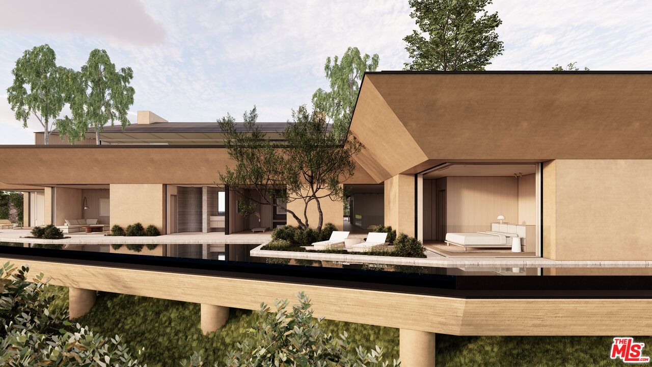 1001 Bel Air Road Los Angeles, CA 90077 - Photo 8 of 22 a view of a large building with a bench