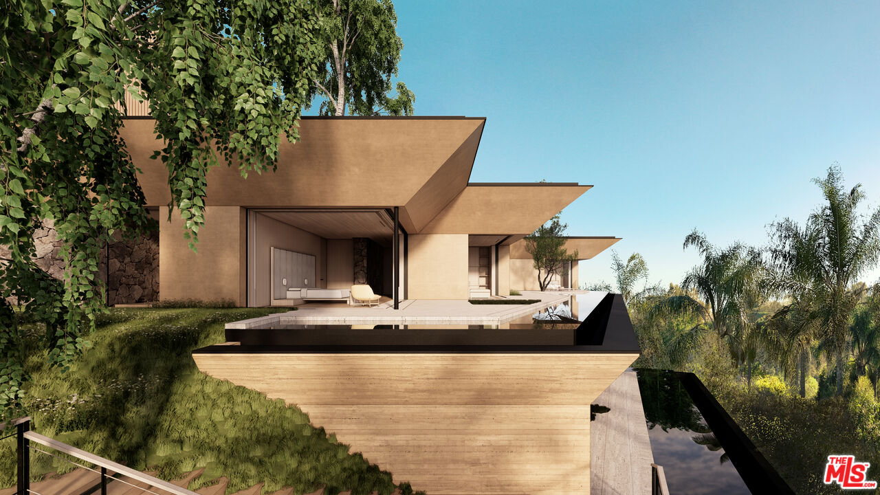 1001 Bel Air Road Los Angeles, CA 90077 - Photo 10 of 22 a view of house with ocean view