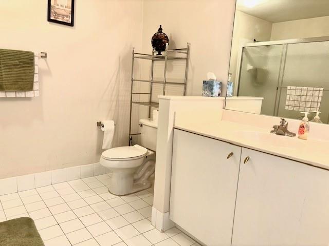 5880 West Sample Road, Unit 105 Coral Springs, FL 33067 - Photo 15 of 23 a bathroom with a sink toilet and shower