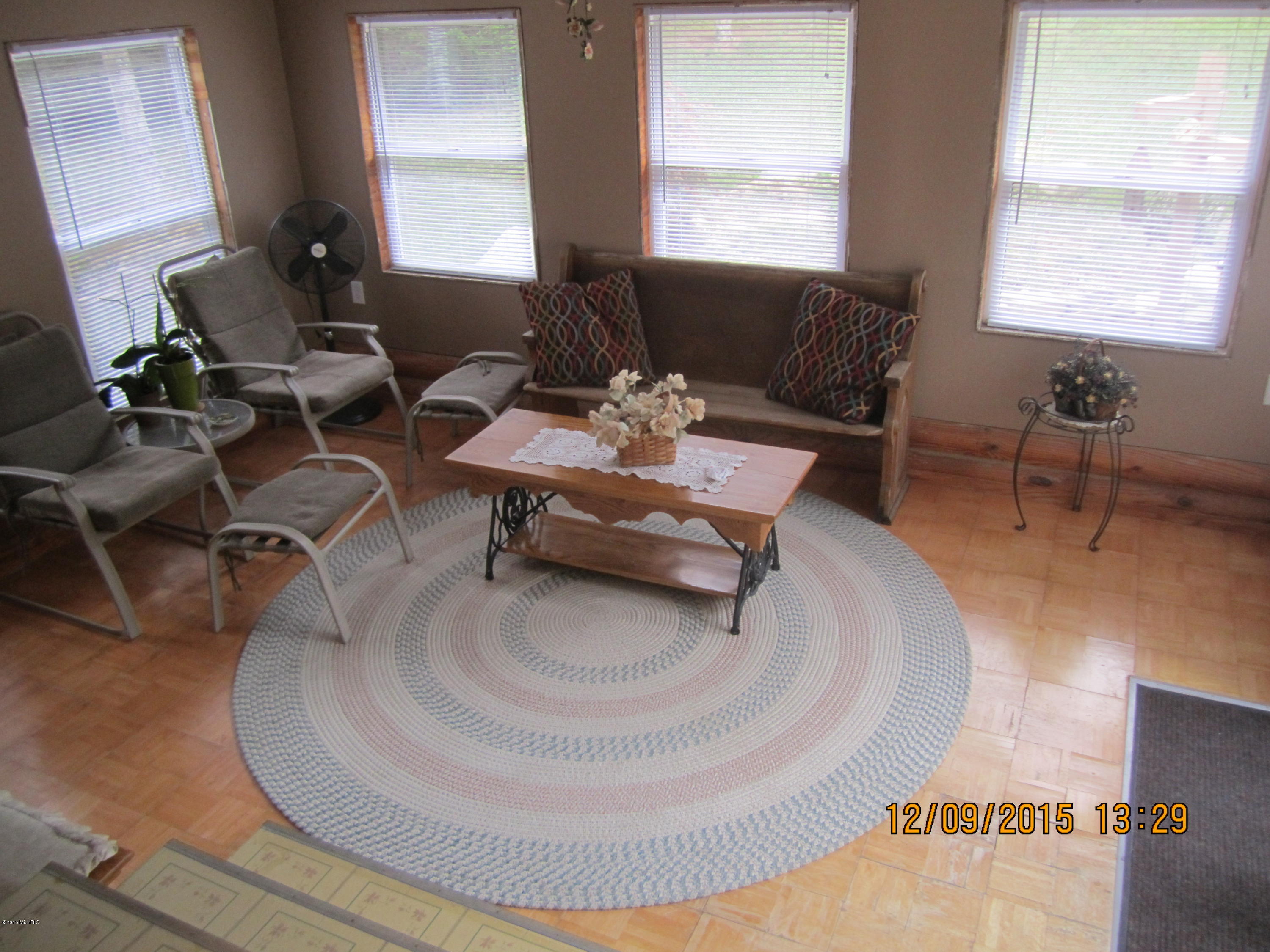 13851 Grass Lake Road Camden, MI 49232 - Photo 30 of 32 sunroom