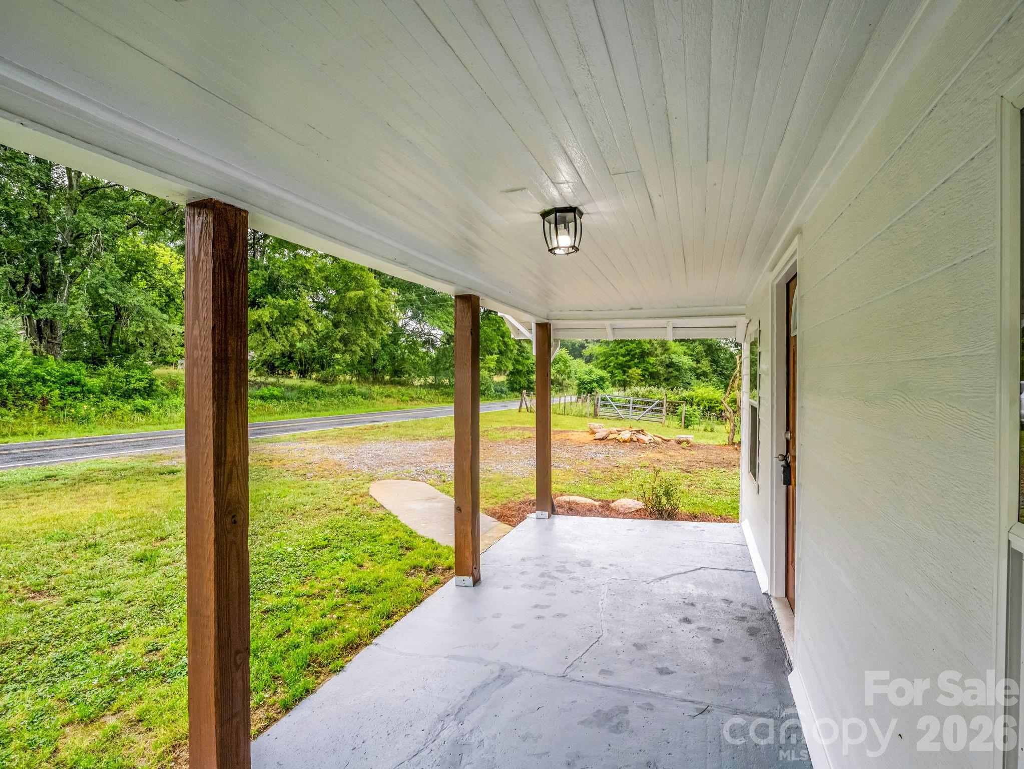 170 Dobbins Road Ellenboro, NC 28040 - Photo 12 of 32 a view of large windows and an outdoor space