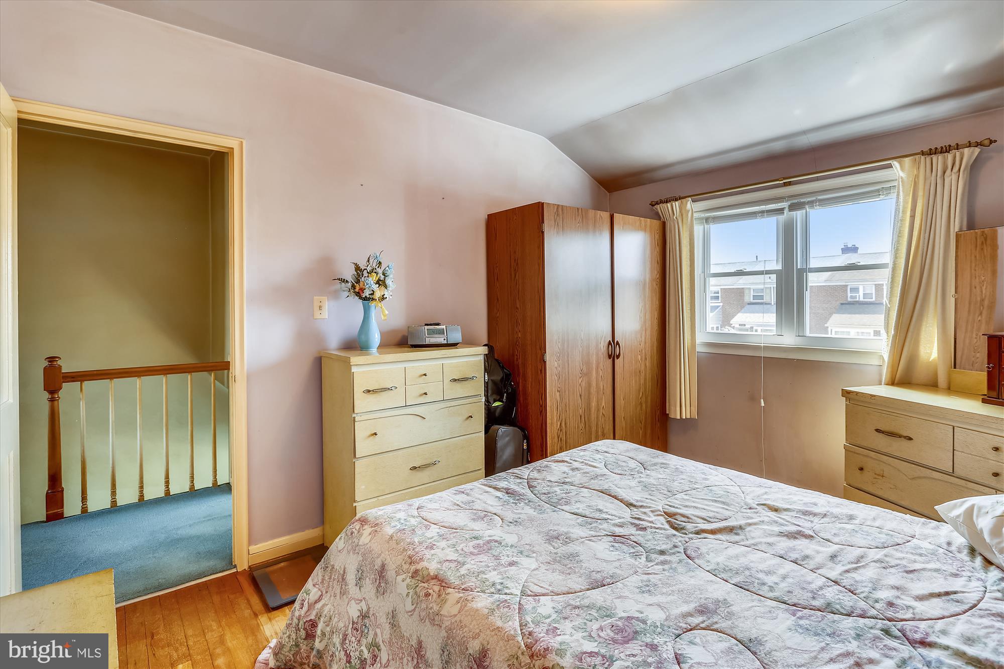1917 Ormand Road Dundalk, MD 21222 - Photo 20 of 22 a bedroom with a bed and a dresser