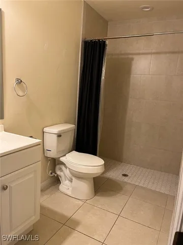 a bathroom with a sink and a yard