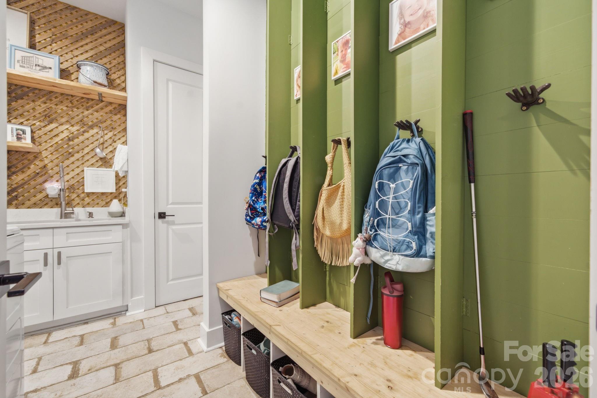 6816 West Duncan Road Indian Trail, NC 28079 - Photo 22 of 38 a view of walk in closet with clothes and shoes