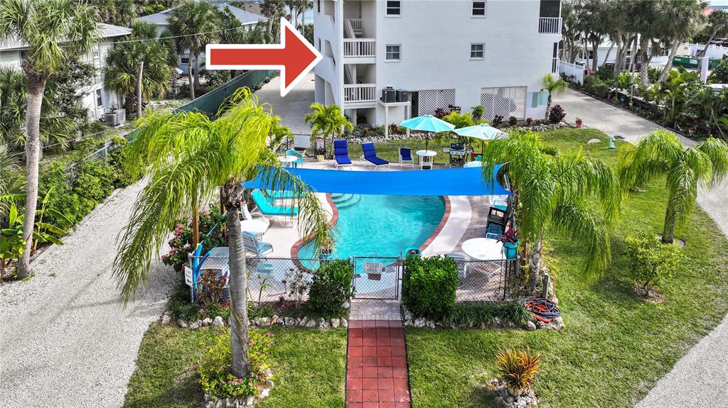 5031 North Beach Road, Unit 116 Englewood, FL 34223 - Photo 1 of 41 an aerial view of multiple house