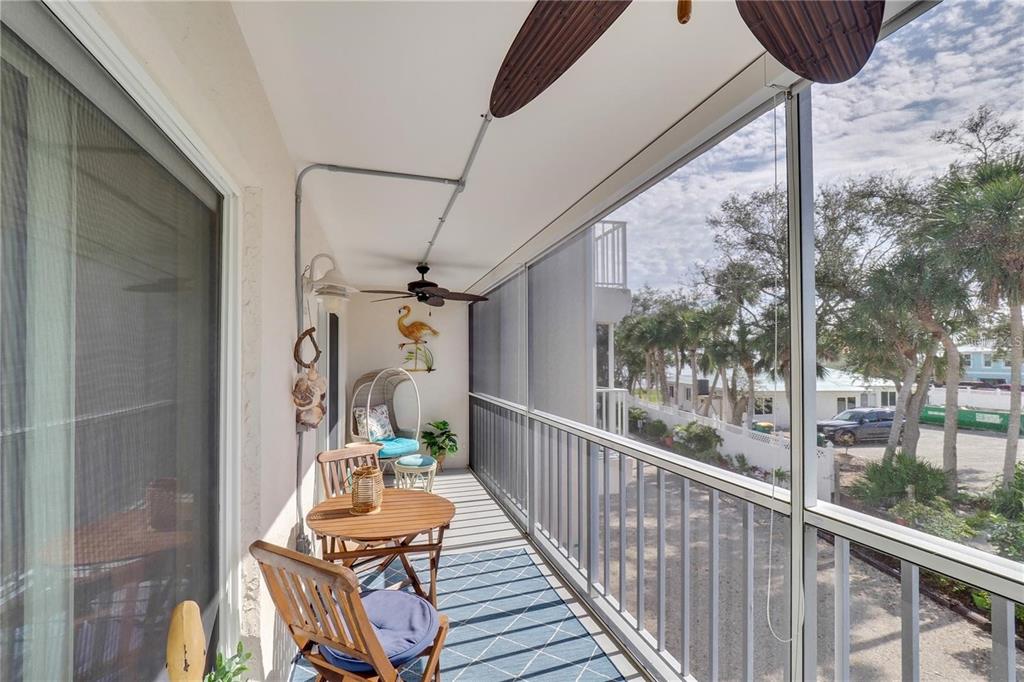 5031 North Beach Road, Unit 116 Englewood, FL 34223 - Photo 24 of 41 a view of a balcony with furniture
