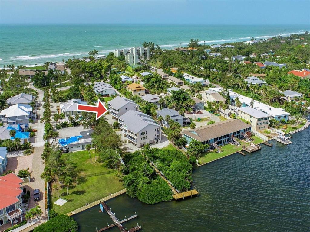 5031 North Beach Road, Unit 116 Englewood, FL 34223 - Photo 5 of 41 an aerial view of multiple house