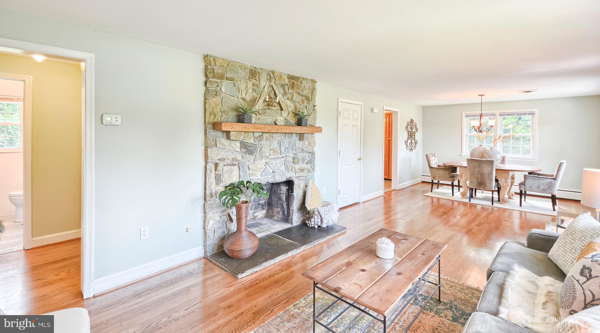 28403 Kemptown Road Damascus, MD 20872 - Photo 15 of 29 Custom stone wood burning fireplace