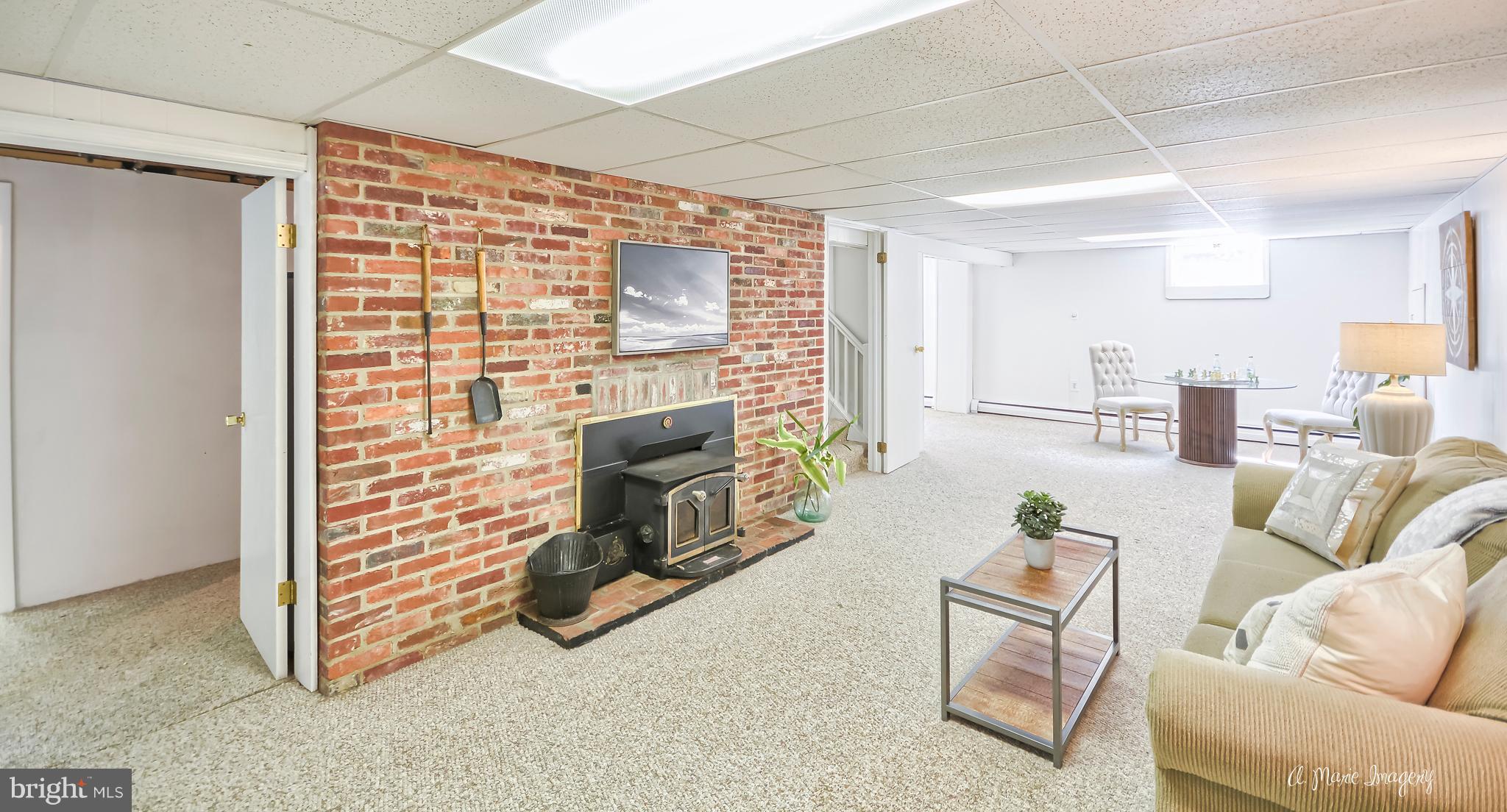 28403 Kemptown Road Damascus, MD 20872 - Photo 23 of 29 Basement with wood stove