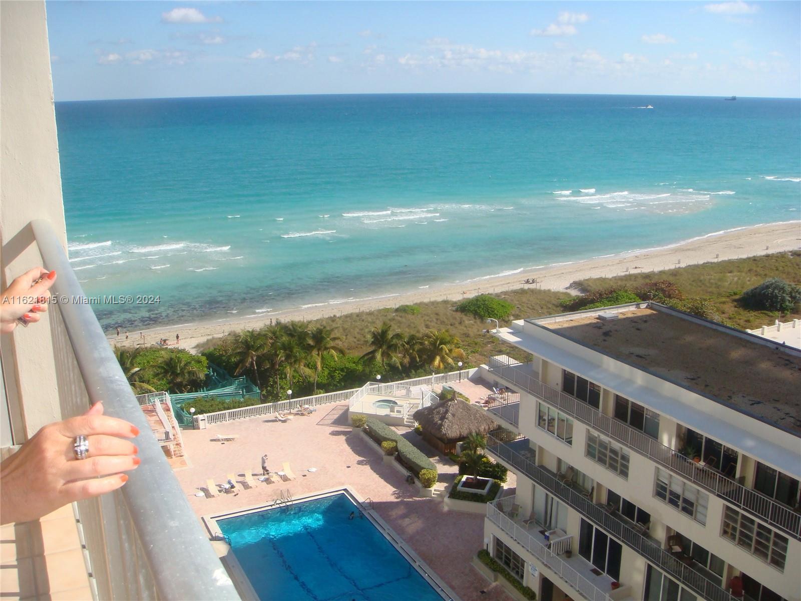 5401 Collins Avenue, Unit 1012 Miami Beach, FL 33140 - Photo 1 of 11 a view of balcony with furniture