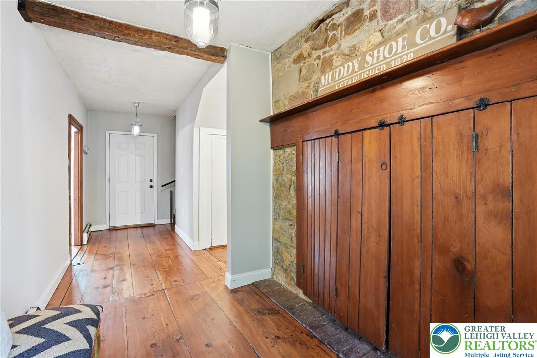 2014 Linden Street Bethlehem, PA 18017 - Photo 8 of 85 Hearty wood flooring and exposed beams create a welcoming entrance.